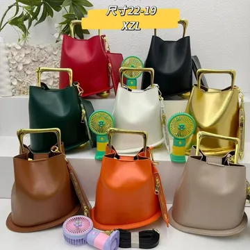 Gold hand bag